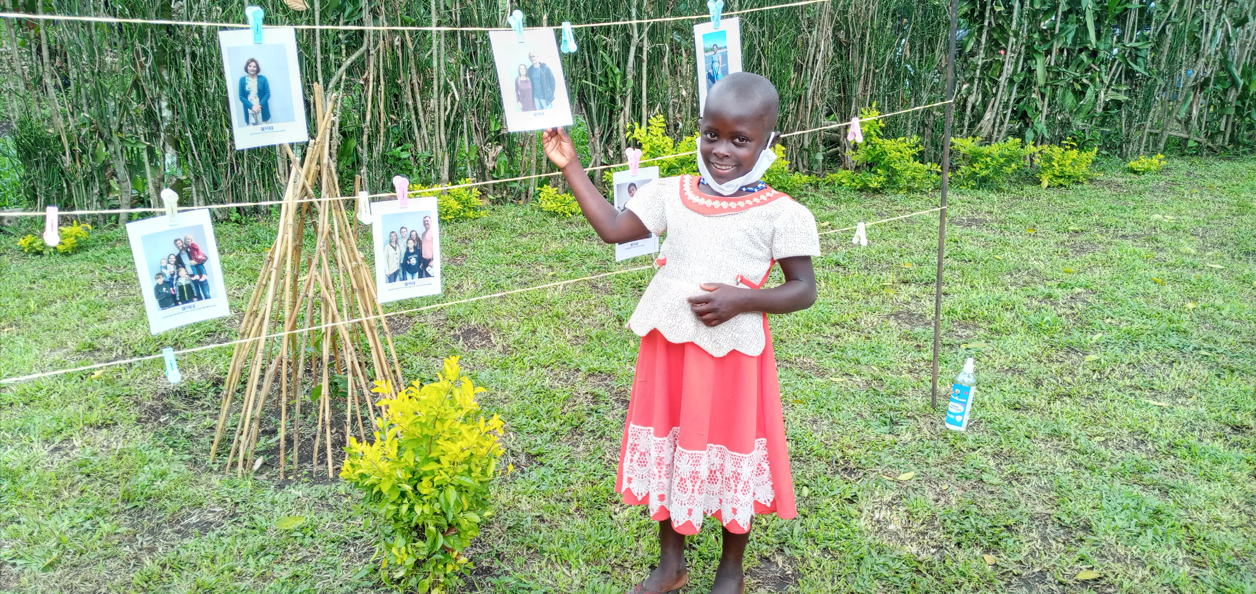 A girl chooses a sponsor during a Chosen event in Uganda. Chosen is a new invitation to child sponsorship where children are enabled to choose their sponsors. This innovative experience puts the power to choose a sponsor in the hands of the child.