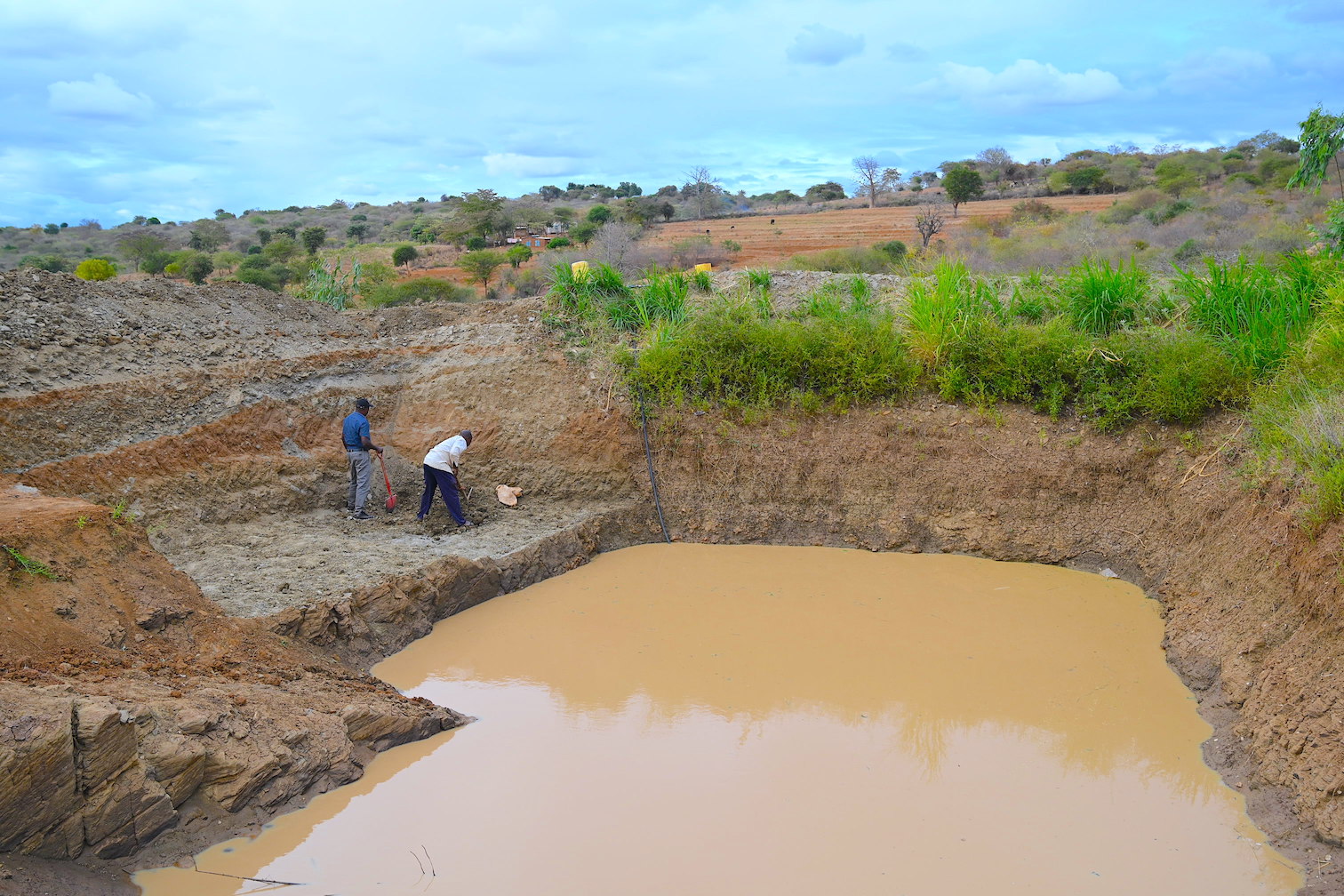 Josphat's farm pond enables him to harvest rain water which he used to irrigate his crops. ©World Vision Photo/Sarah Ooko.