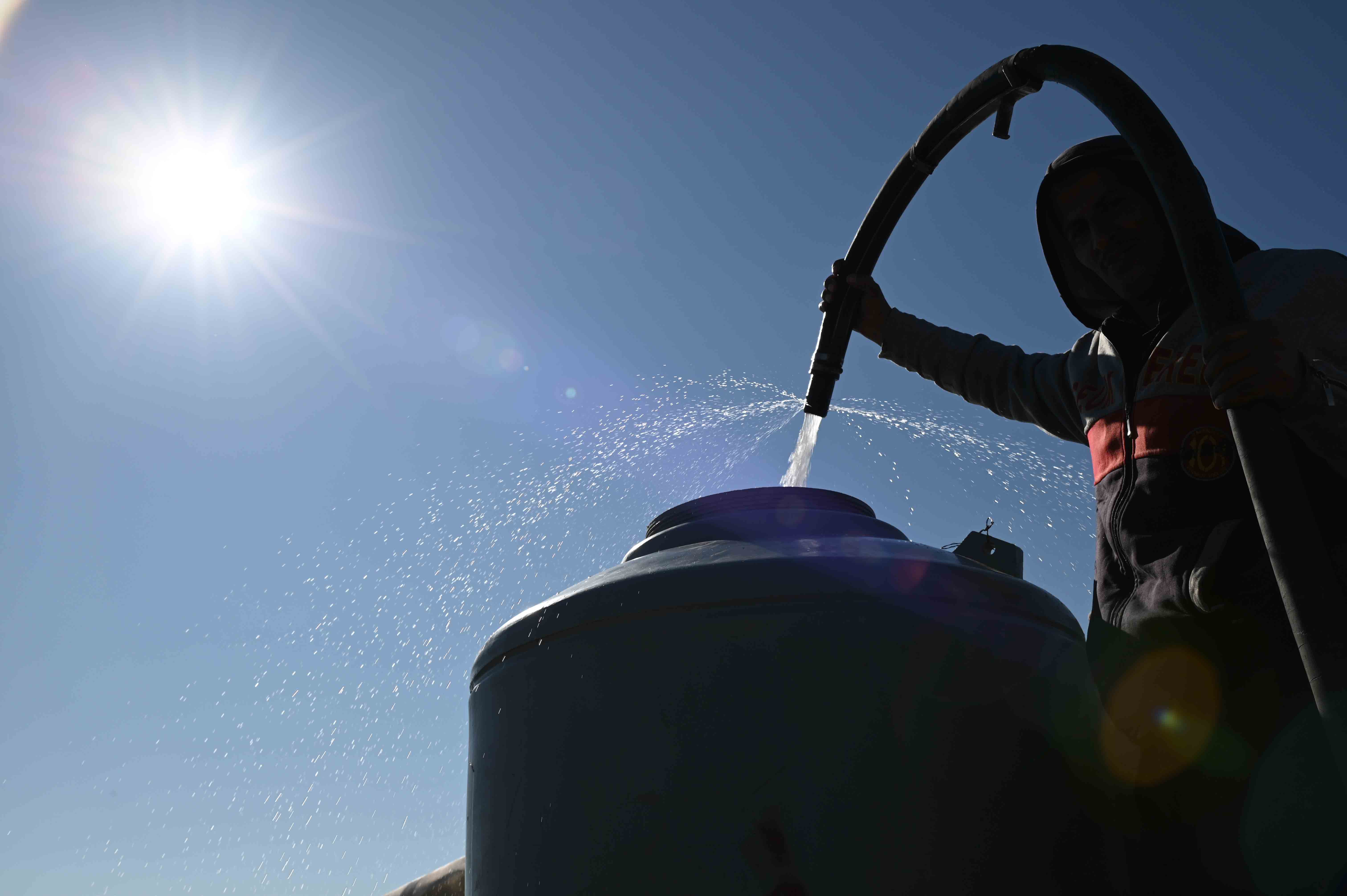 filling tanks with water