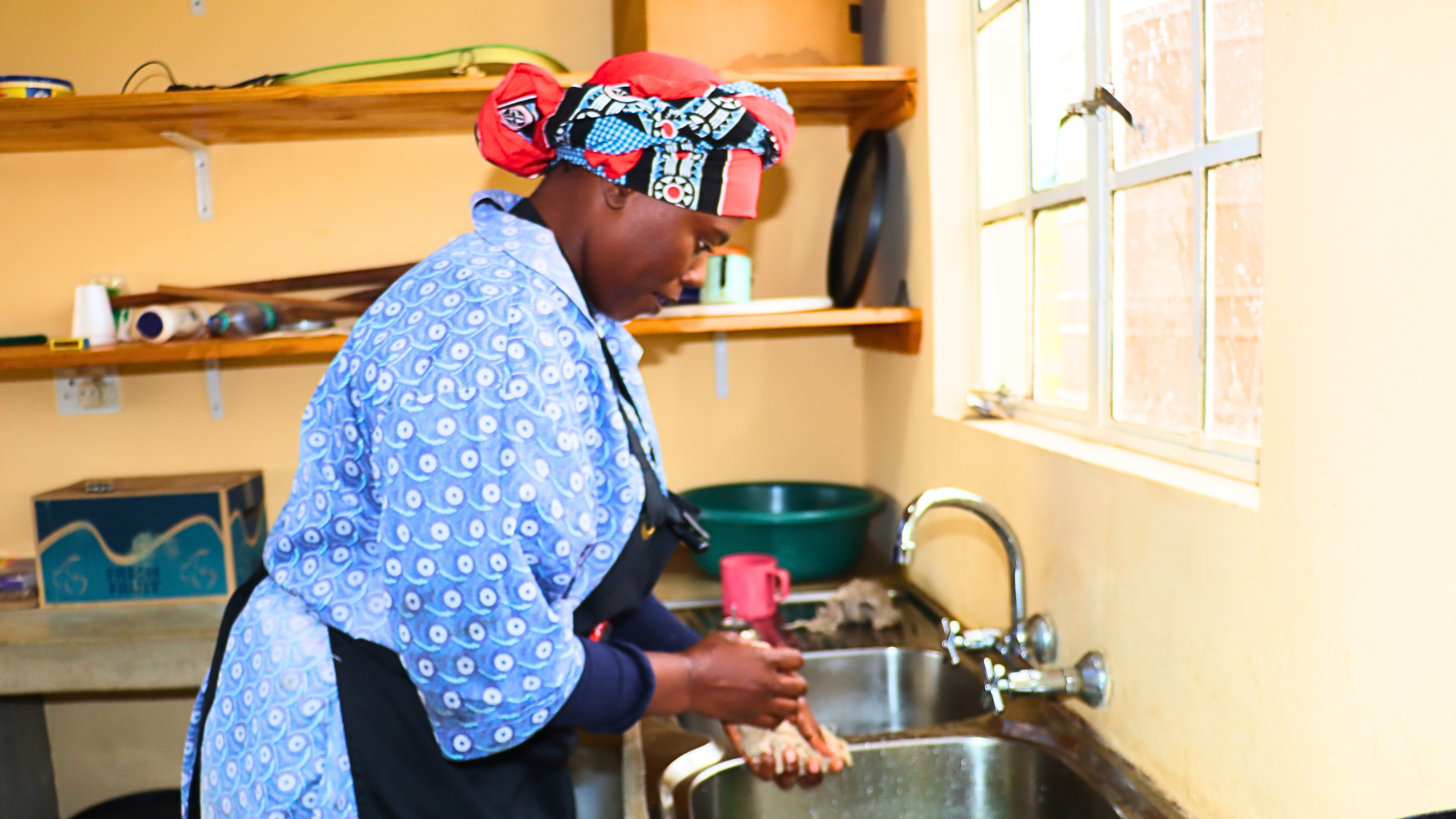 A school kitchen with reliable and safe running water through a World Vision supported water system.