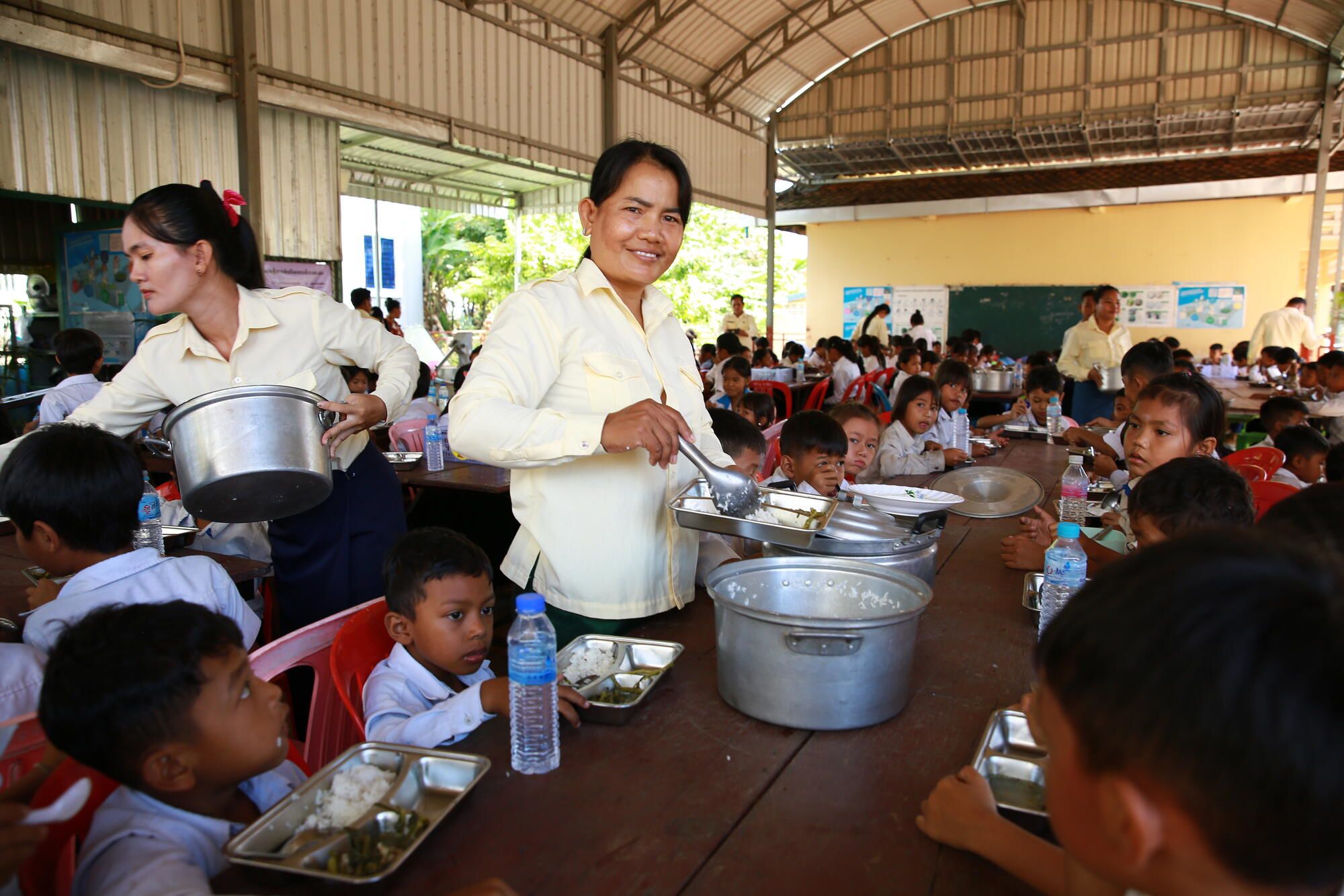 School staff feed all the school children healthy and nutritious food