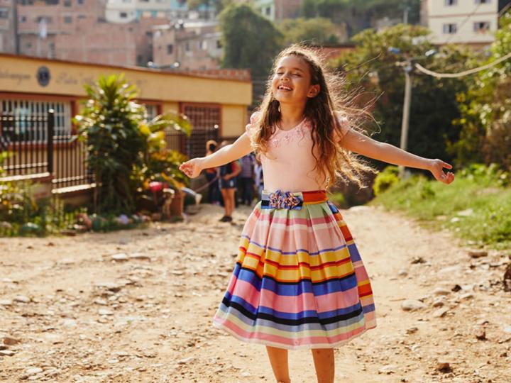 Girl dances in the streets in Colombia