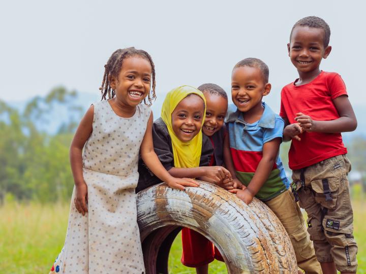 Children smiling at the playground