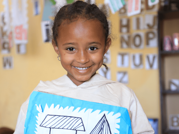 A child at ECD Center Smiling