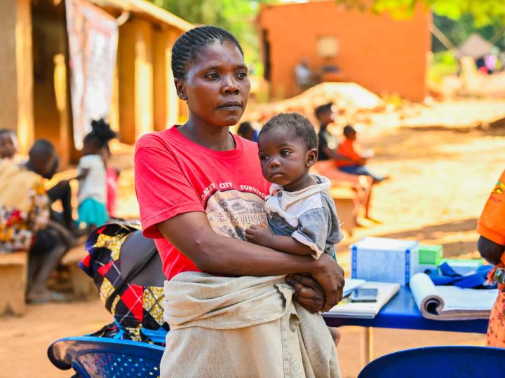 Mother with child in her arms in DRC 
