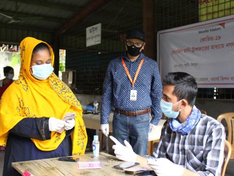 Laboni, 26, a single mother, receives cash grant support from World Vision. 