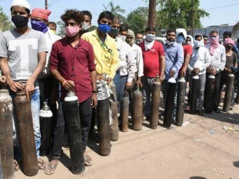 Krishna, in line to buy an oxygen tank for his father