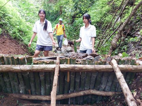 Youth leaders initiate the construction of check dams at Ban Huai Suea Thao to mitigate flash floods and drought
