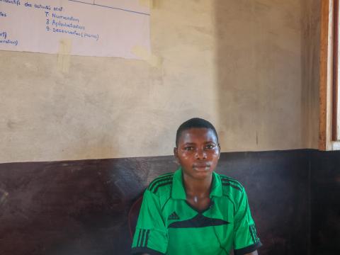 Marie, 15, plays football at a World Vision Child Friendly Space in Kazumba Marie worries about the militias in Kasai Central restarting