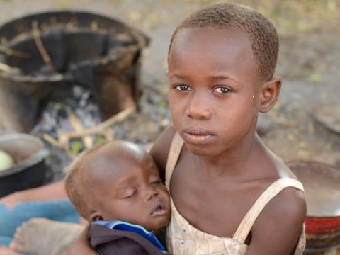 Lochero - forced to take care of siblings instead of going to school Lochero - forced to take care of siblings instead of going to school