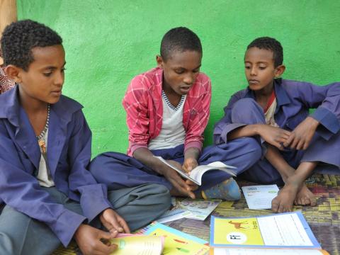 Reading buddies work together in Ethiopia Reading buddies in Ethiopia